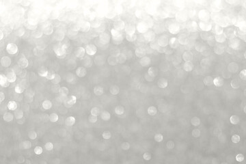 Soft silver bokeh background with shimmering lights for design and photography Demonstration Color of the Year 2026 © Nataliia
