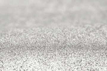 Glittering silver surface with tiny specks of light and a soft shimmer backdrop Demonstration Color of the Year 2026