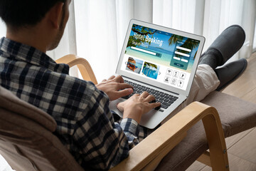 Obraz premium Online hotel accommodation booking website provide modish reservation system . Travel technology concept .