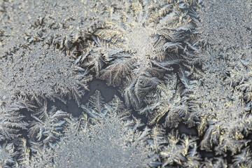 Close-Up of Intricate Ice Crystals on a Frosty Surface