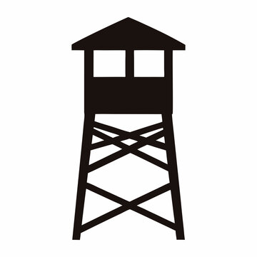 Silhouette of guard tower with observation deck and crisscross leg supports