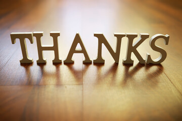 Thanks Wooden Letters on Floor Representing Appreciation and Gratitude Concept