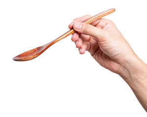 Male hand holding a wooden spoon isolated on white background.