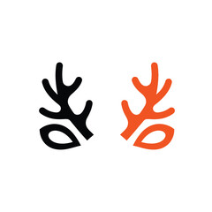 this image presents a striking visual contrast with two antler like shapes one rendered in black and the other in a vibrant orange hue creating