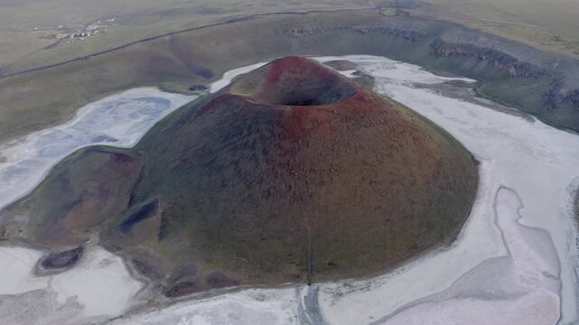 Aerial orbit view of dried Meke crater lake, a dormant volcano landscape in Turkey