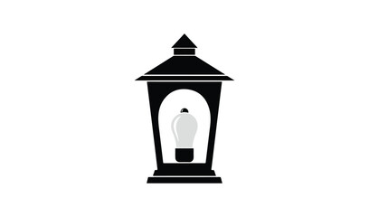 Fototapeta premium Classic black outdoor lantern with a light bulb inside