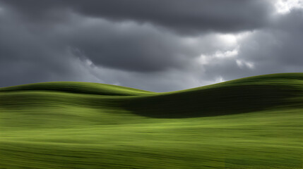 Rolling Hills Under Stormy Skies: A sweeping landscape captures the raw power of nature, where rolling green hills stretch towards a dramatic sky.