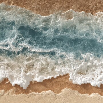 Aerial top-down view of turquoise ocean waves crashing onto sandy beach with foamy textures for coastal and summer design themes