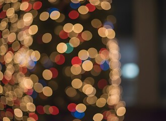 Vibrant abstract bokeh lights create a dreamy, blurred background, perfect for festive holiday designs and joyful celebration themes, capturing a magical and illuminated atmosphere