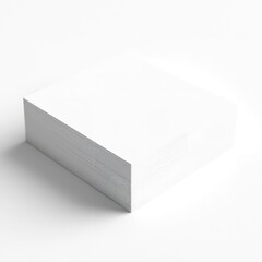 Fototapeta premium Stack of blank white business cards rests on a clean surface ready for custom printing and branding design