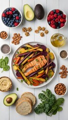 Healthy salmon and vegetable dish with avocado, berries, nuts, and whole grain bread, featuring nutritious ingredients for a balanced diet