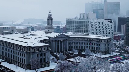 Denver Civic Center in snow, wide angle, aerial video, Denver, CO 4K