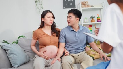 Asian young pregnant wife visit maternal health center with her husband. 