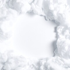 Fluffy white shapes frame blank space