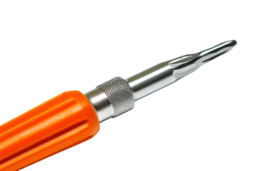 Orange handle screwdriver with metal tip isolated on transparent background. Closeup view screwdriver on white background.