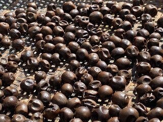 Dried Ma Fruits on Woven Basket