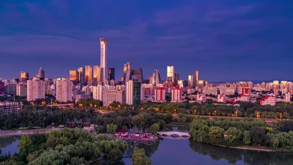 Beijing Skyline with Illuminated Architecture and River at Sunset