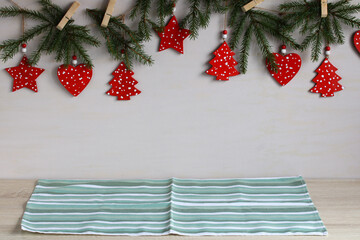 Christmas branches with rustic ornaments and empty space