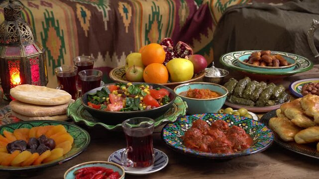 Halal Eid Ramadan food, Oriental dishes on the table. Dolma samosa pide dates couscous fruits