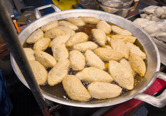 Frying Fish Cakes in Pan for Street Food