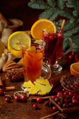 Hot Christmas drinks with ingredients.