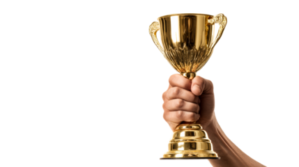 A triumphant human hand proudly holds a gleaming golden trophy aloft, symbolizing achievement and victory, perfect for representing success in competitions and awards.