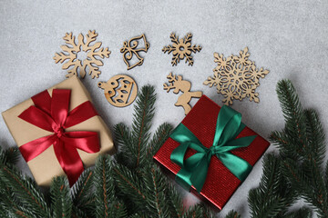 Christmas gift. Top view of image on gray background with space for decoration.
