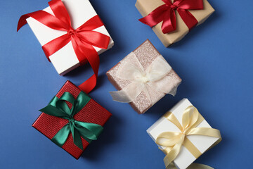 Christmas gift. Top view of the image on a blue background with space for decoration.
