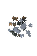 Obraz premium Scattered puzzles on a white background with selective focus. 