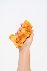 Baked bread stuffed with chicken sausage and hamd on white background