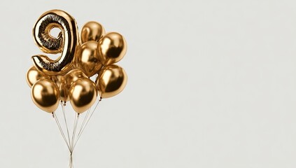 Golden balloons in the shape of the number nine float upwards.