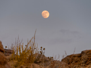 Full moon in the mountains on the island of Mykonos in Greece