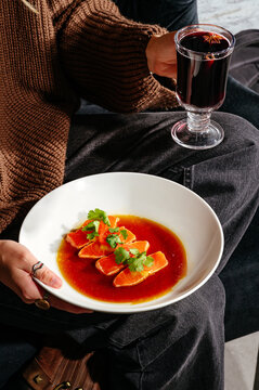 pieces of tuna in sauce and mulled wine