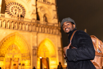 Young man tourist traveling in paris at night