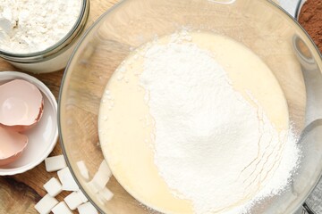 Different ingredients for dough on table, flat lay