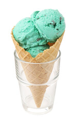 Waffle cone with tasty mint chocolate chip ice cream isolated on white
