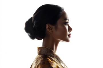 Elegant woman with bun hairstyle in profile

