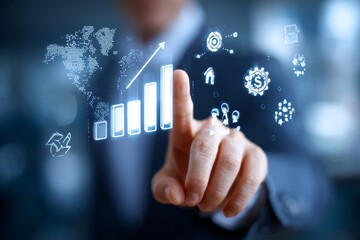 A man is pointing at a graph on a computer screen