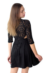 Young woman in a stylish black lace dress with an open back, looking over her shoulder with a thoughtful expression. Isolated on white, perfect for fashion, beauty, or lifestyle themes.