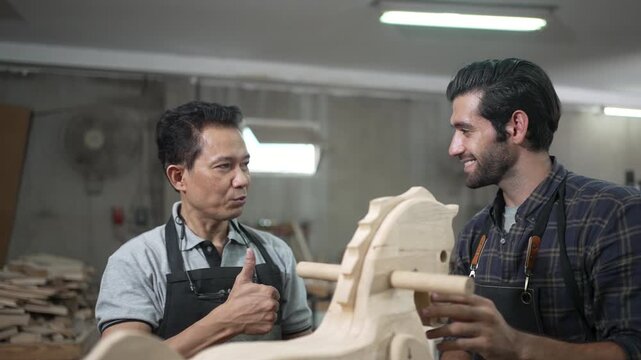 Carpenters are working at workshop. Small business and craft product.