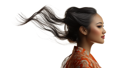 Profile of woman with hair blown by wind
