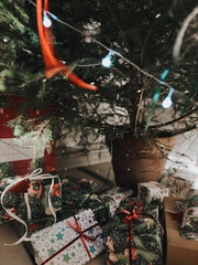 Gift boxes under Christmas tree. Home, natural. High quality photo