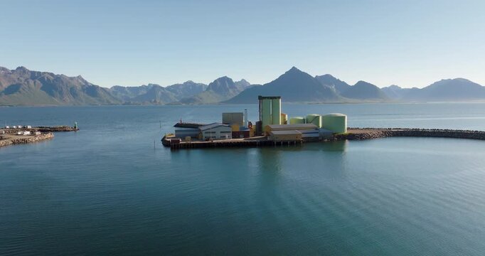 Industrial Silos Standing Along the Rugged and Windy Shores of Coastal Norway