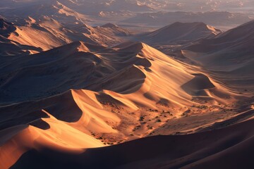 Top view of desert dunes with long shadows at sunset with copy space