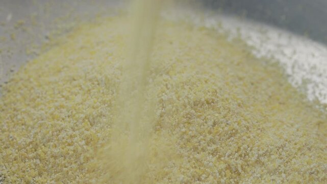 Yellow uncooked  corn polenta