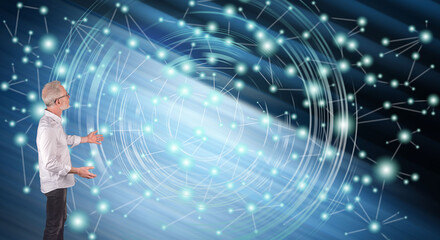 A virtual network explained by a businessman on a wall screen