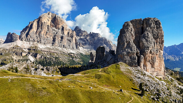 Cima Tofana di Mezzo and Cinque Torri in the Dolomites, Italy &ndash; Aerial Panoramic Scenic Landscape with Clouds, Late August

