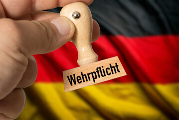 Flagge von Deutschland und Stempel Wehrpflicht