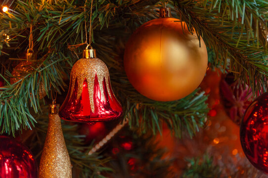 Green fir tree with globes and colored ornaments