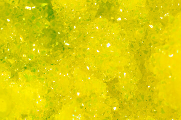 Green crystal mineral stone. Gems. Mineral crystals in the natural environment. Texture of precious...